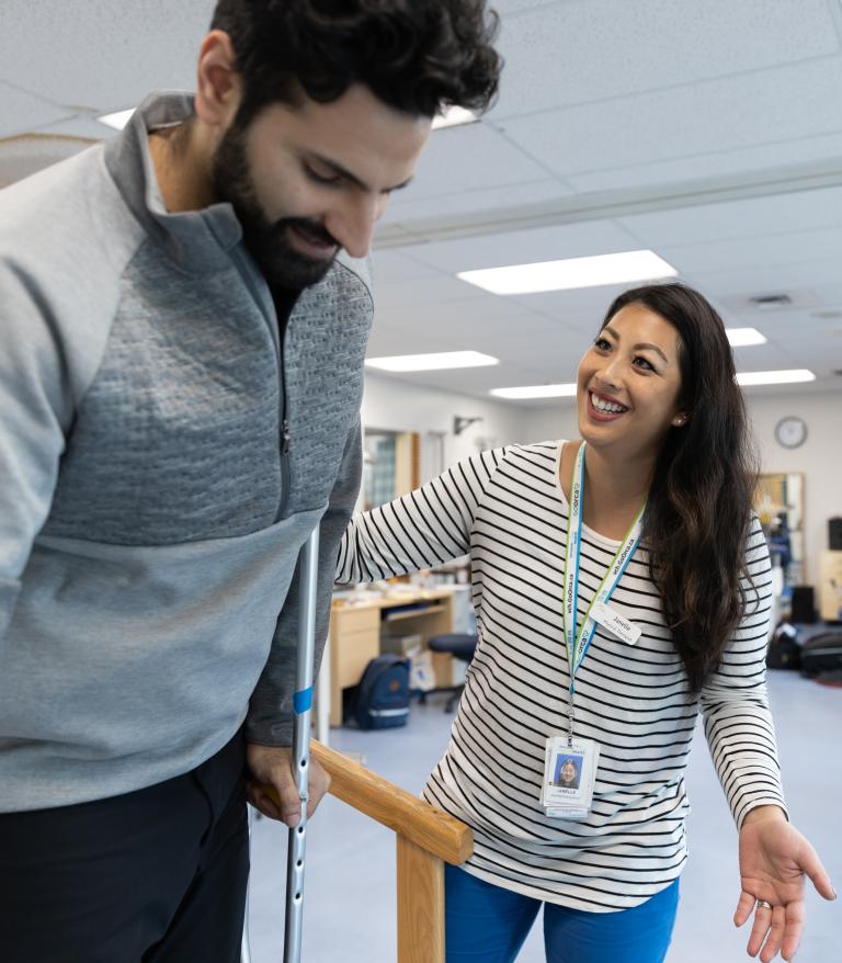 Physiotherapist helps a patient