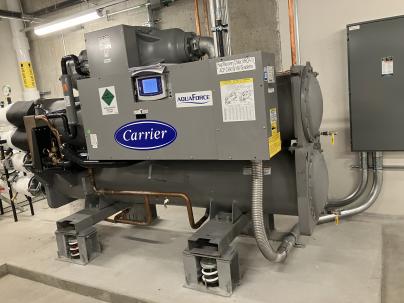 a large piece of equipment in a buildings mechanical room