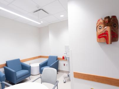 Waiting area in hospital with indigenous artwork carving