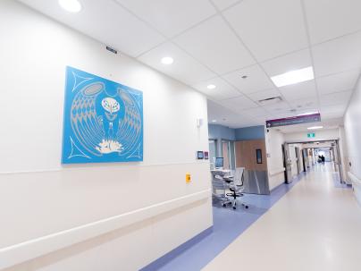 Hospital hallway with indigenous artwork on the wall