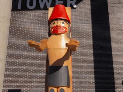 Welcome figure outside a hospital building