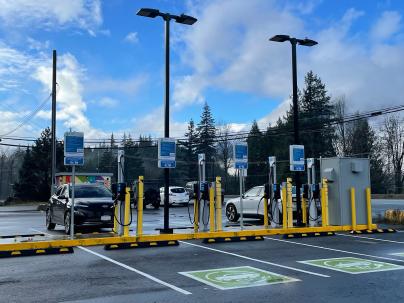 Parking lot with electric vehicle charging stations