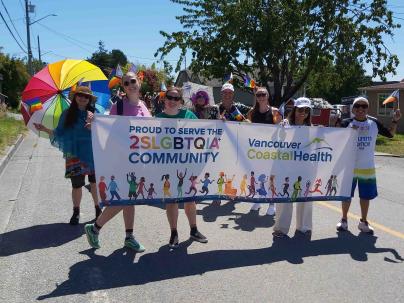 VCH Staff with a banner VCH staff and medical staff participated in the 2024 Vancouver Pride Parade. 