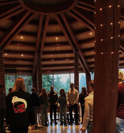 VCH Staff in a circle participating in a training session